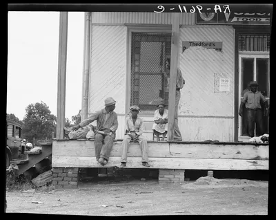 Negroes hanging around the plantation store. Mississippi Delta, 1936