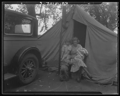 Mother and three children in a California squatter camp, 1936