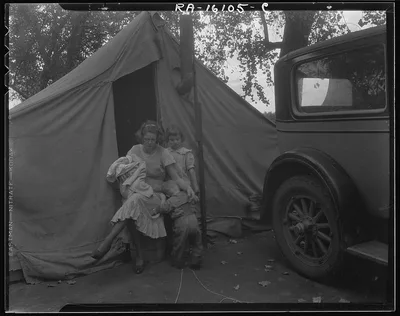 Mother and three children in a California squatter camp, 1936
