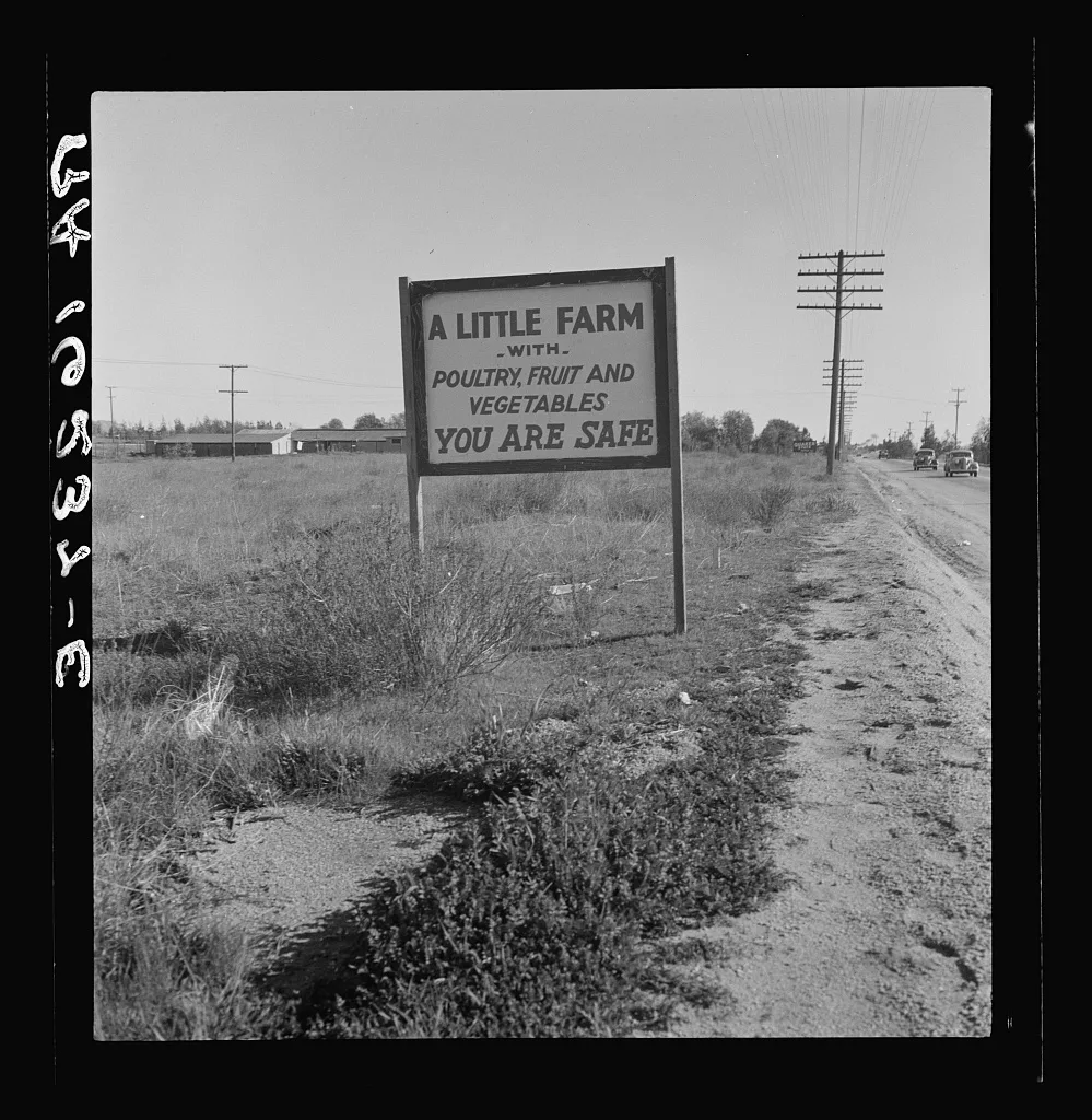 Real estate sign along the highway on which hundreds of drought…, California, 1937