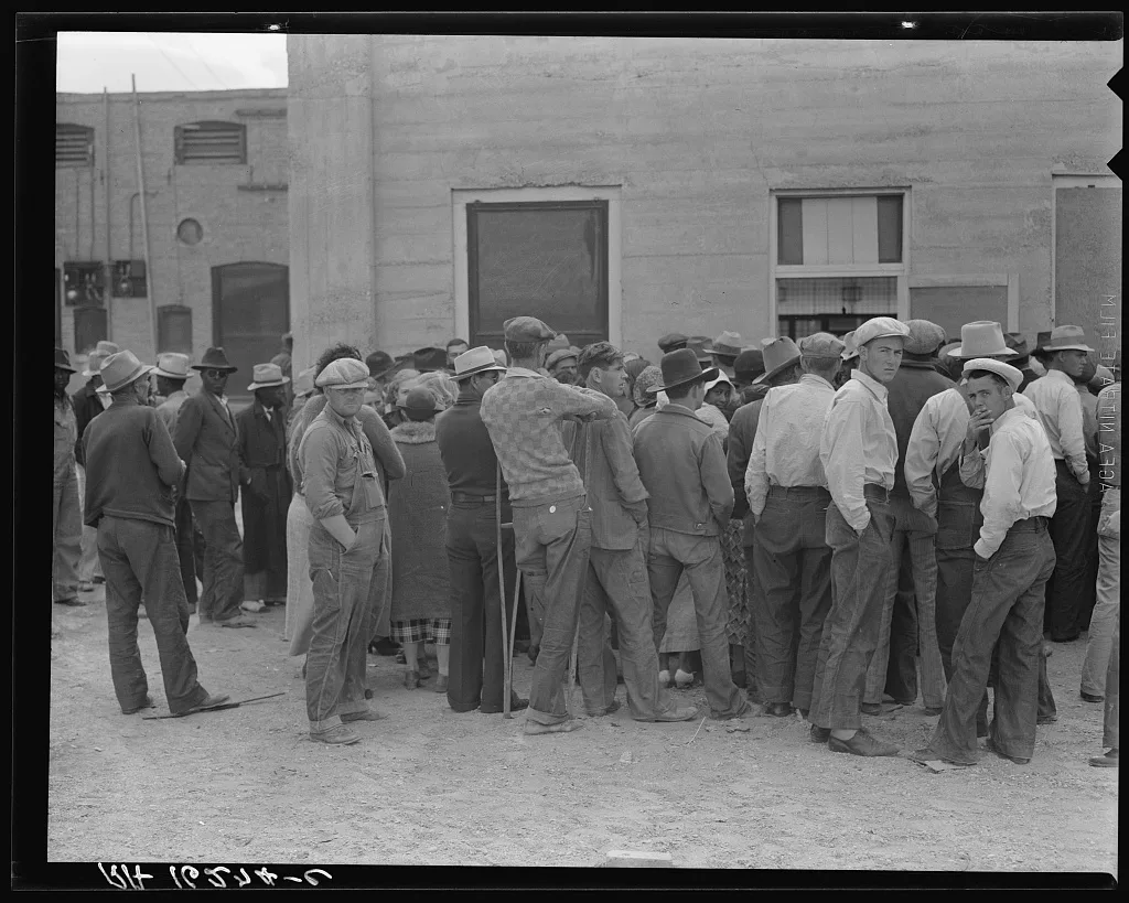 Waiting for the semi-monthly relief checks at Calipatria, California, 1937