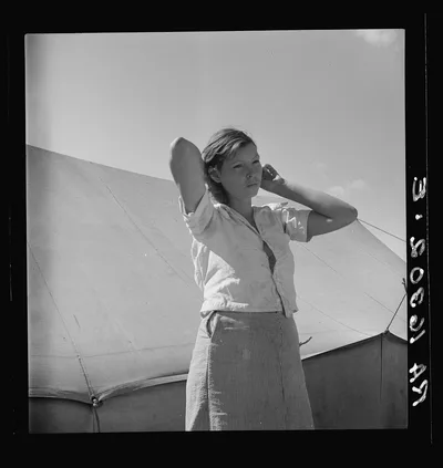 Woman in pea picker's camp. California. "I seen our corn dry up and…, 1937