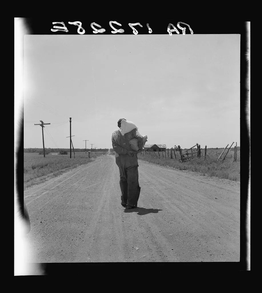 Man going home with relief. Bought provisions. Near Oil City,…, Oklahoma, 1937