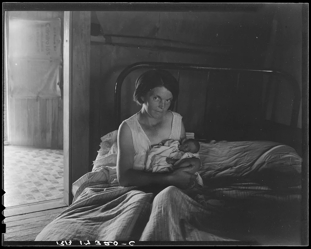 Sharecropper's wife and her youngest child. Near Cleveland,…, Mississippi, 1937