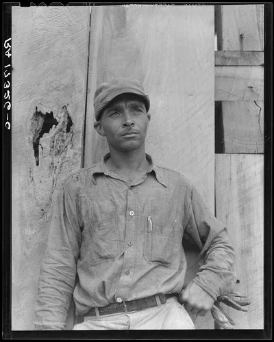 Member of the Delta cooperative farm. Hillhouse, Mississippi, 1937