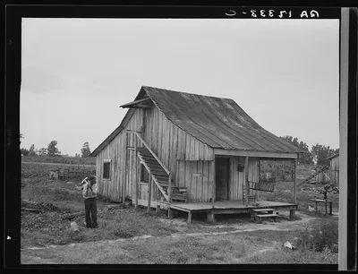 Cottonworker's cabin with outside stairway and loft. Near…, Arkansas, 1937