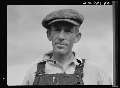 Photograph from Georgia: Father of landless sharecropper family. Macon…