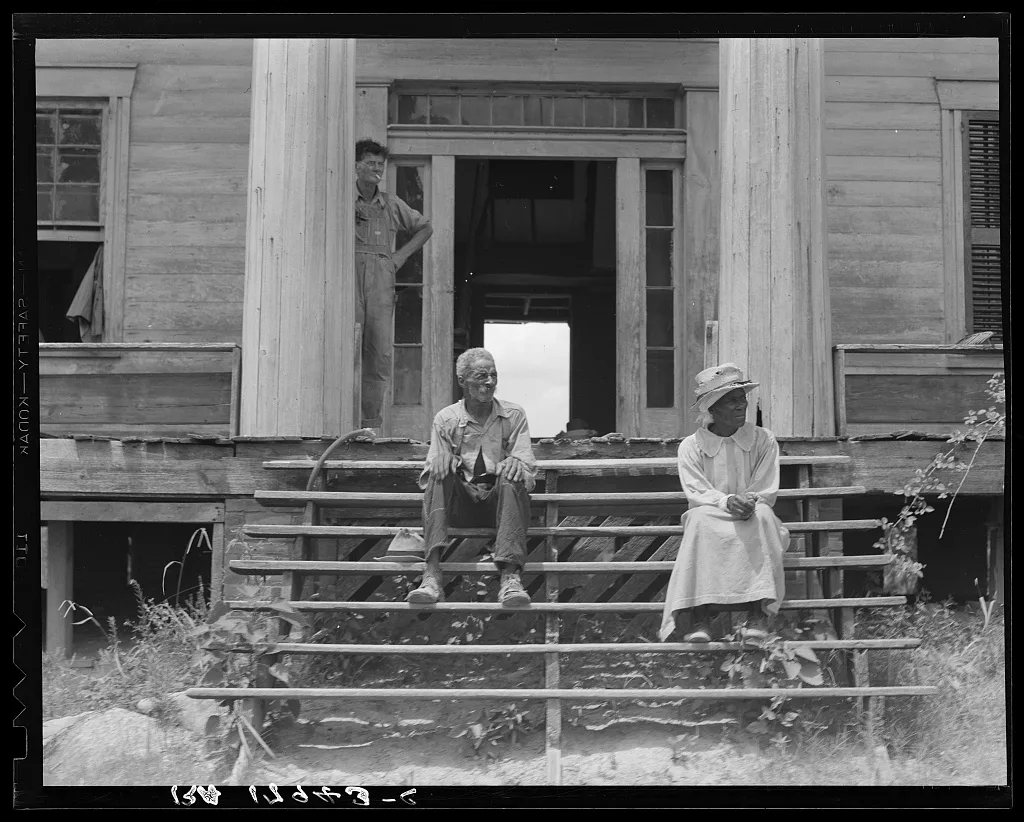 Ex-slave and wife on steps of plantation house now in decay. Greene…, Georgia, 1937