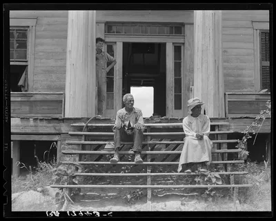 Ex-slave and wife on steps of plantation house now in decay. Greene…, Georgia, 1937