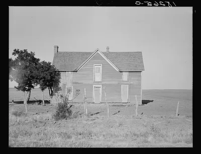 Vacant farmhouse in area of mechanization and drought near Olustee,…, Oklahoma, 1938