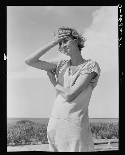 Wife of a migratory laborer with three children. Near Childress,…, Texas, 1938