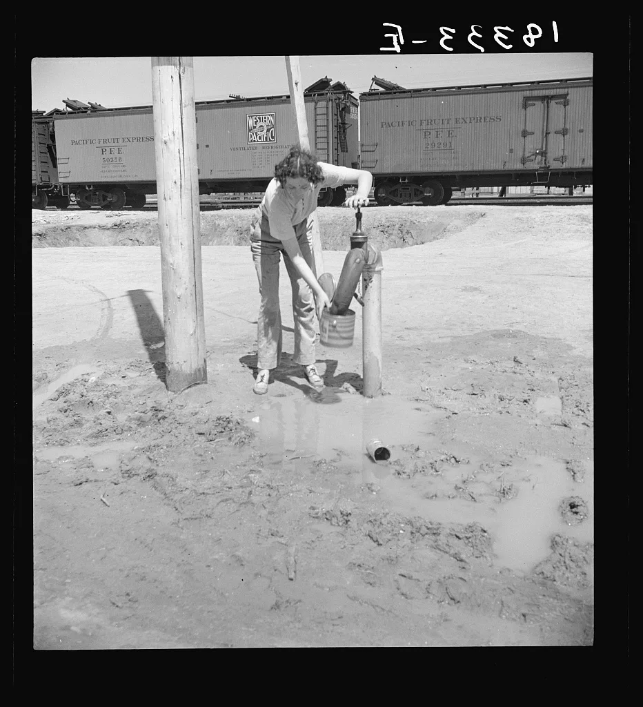 One faucet by the packing sheds is the only source of water for…, California, 1938