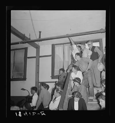 Listening to the speaker at the Conference to Aid Agricultural…, California, 1938
