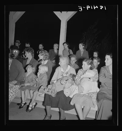 Mothers on the sidelines, watching the Halloween party. Shafter…, California, 1938