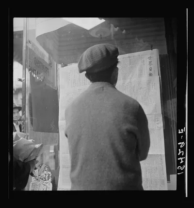 San Francisco Chinaman reading news of surrender of Canton to…, California, 1938