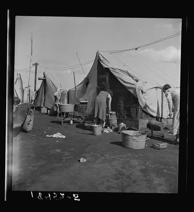 Orange pickers' camp. Tulare County, California. Rent one dollar per…, 1938