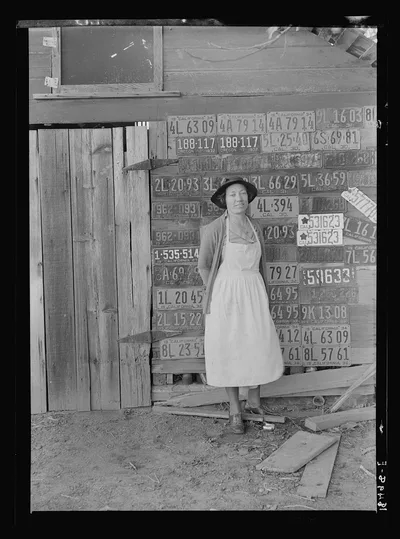 Farm woman beside her barn door. Tulare County, California. No more…, 1938