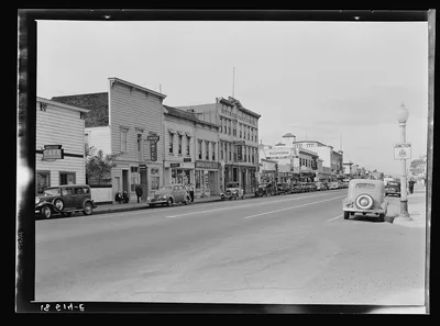 Up the main street of a valley town. Gilroy, California, 1938