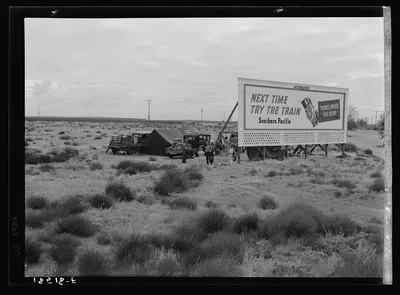 Three families camped on the plains along U.S. 99 in California. They…, 1938