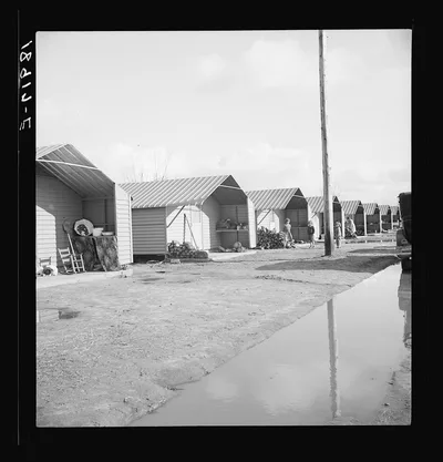 Prefabricated steel dwellings (one step up from a tent) replace the…, California, 1939