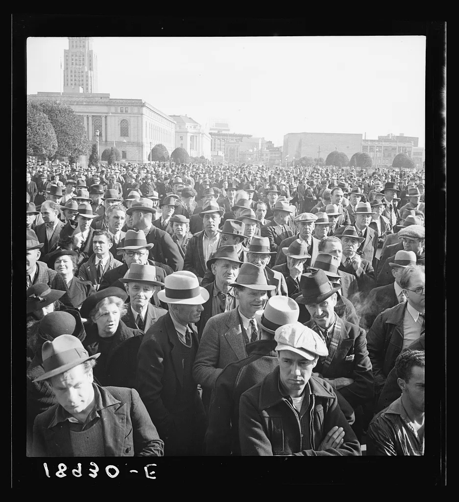 Listening to speeches at mass meeting of Works Progress…, California, 1939