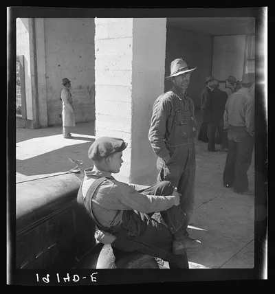 Pea pickers waiting at Farm Security Administration (FSA) office for…, California, 1939
