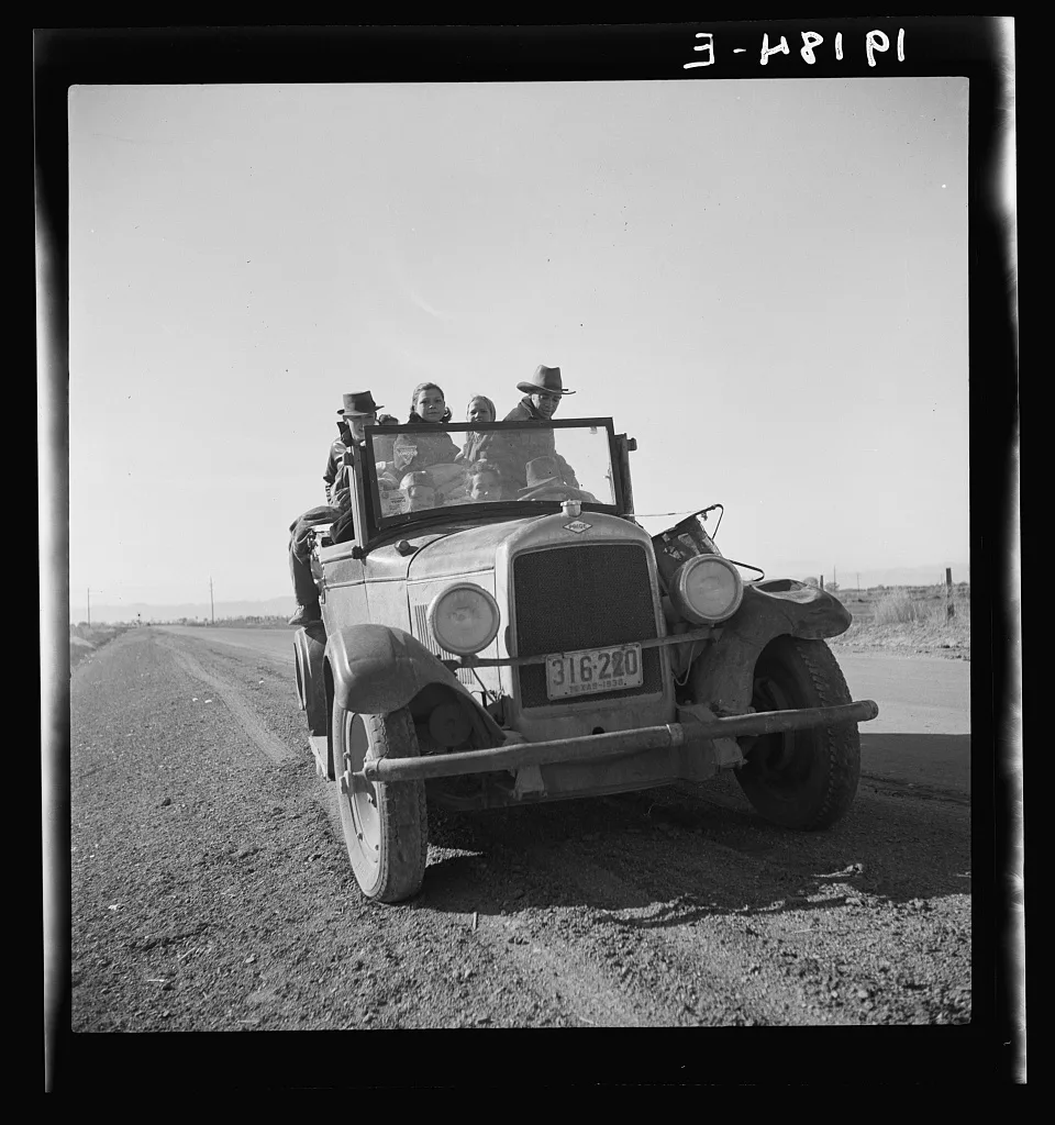 Eight related persons just arriving in this roadster from Texas. In…, California, 1939