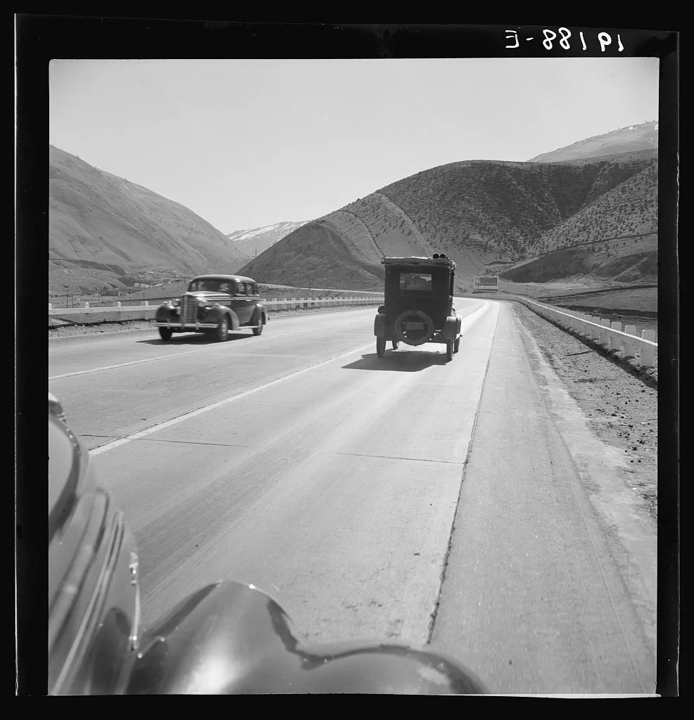 On U.S. 99. in Kern County on the Tehachapi Ridge. Migrants travel…, California, 1939