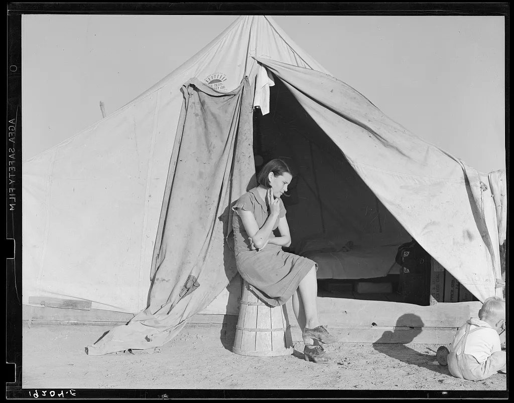 Young migrant mother who lives in one of the tents. California. Farm…, 1939