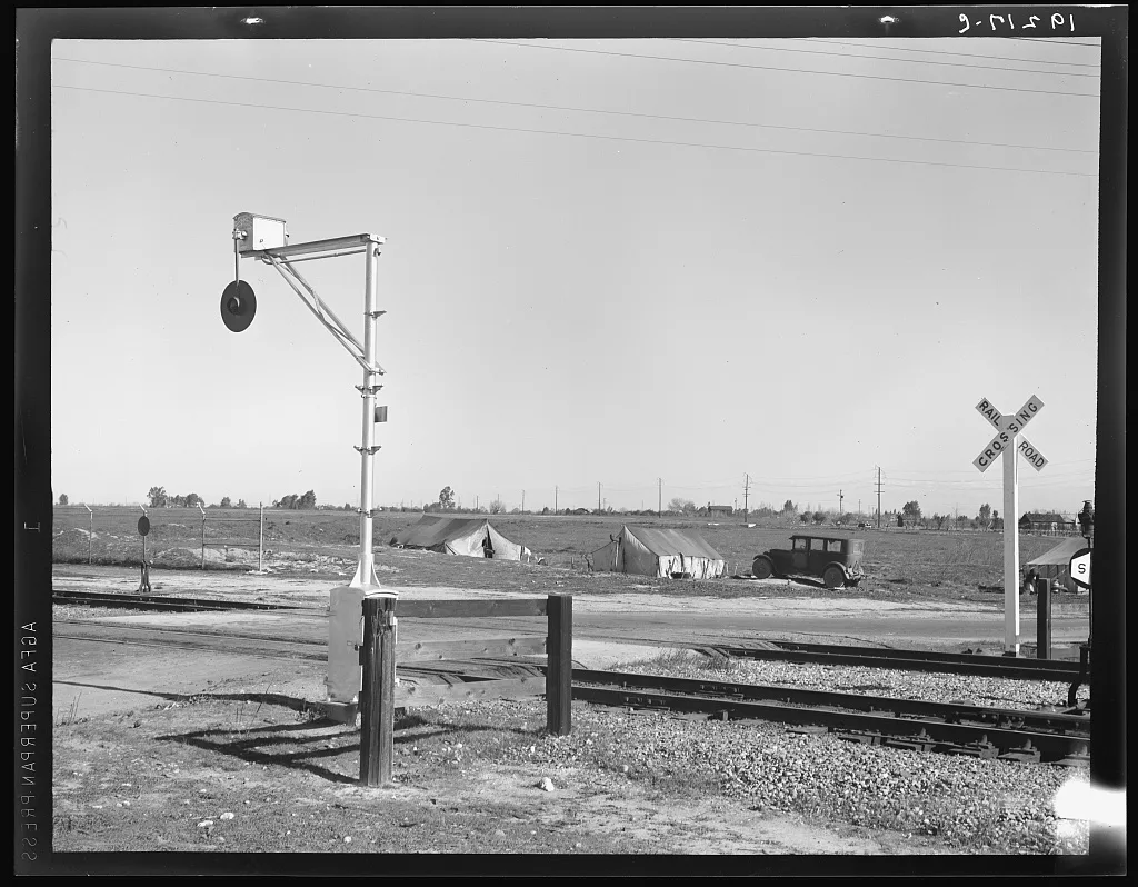 Migrants' tents are a common sight along the right of way of the…, California, 1939