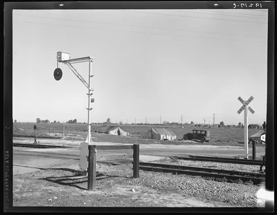 Migrants' tents are a common sight along the right of way of the…, California, 1939