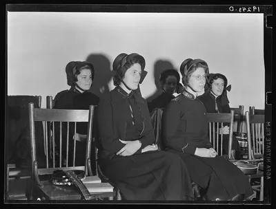 Visiting lassies sit on rostrom. Salvation Army, San Francisco,…, California, 1939