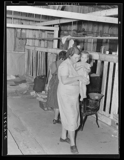 Near Shafter, California. Family from Oklahoma lives in old cow-barn…, 1939