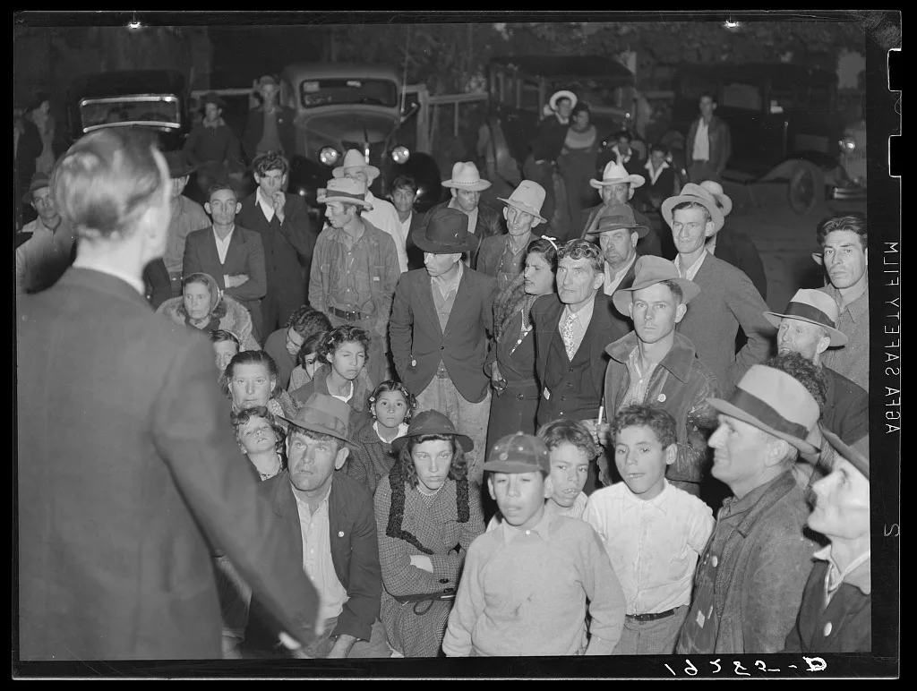 Kern County, California. Night street meeting of cotton strikers near…, 1939