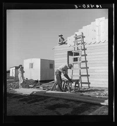 Father and son building house on outskirts of Salinas, California. …, 1939