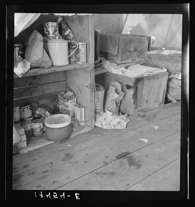 Tent interior in a pea pickers' camp. Food supply and household…, California, 1939