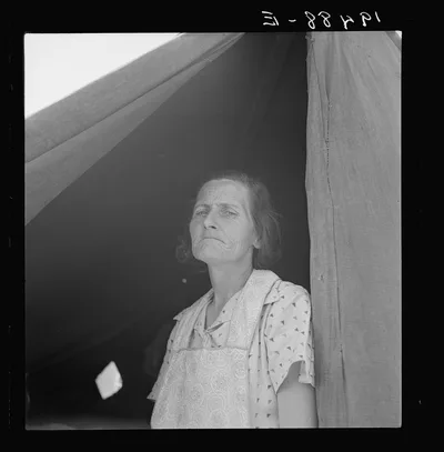 Migrant woman from Arkansas living in contractor's camp near Westley,…, California, 1939