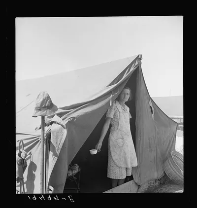 Migrant woman from Arkansas living in contractor's camp near Westley,…, California, 1939