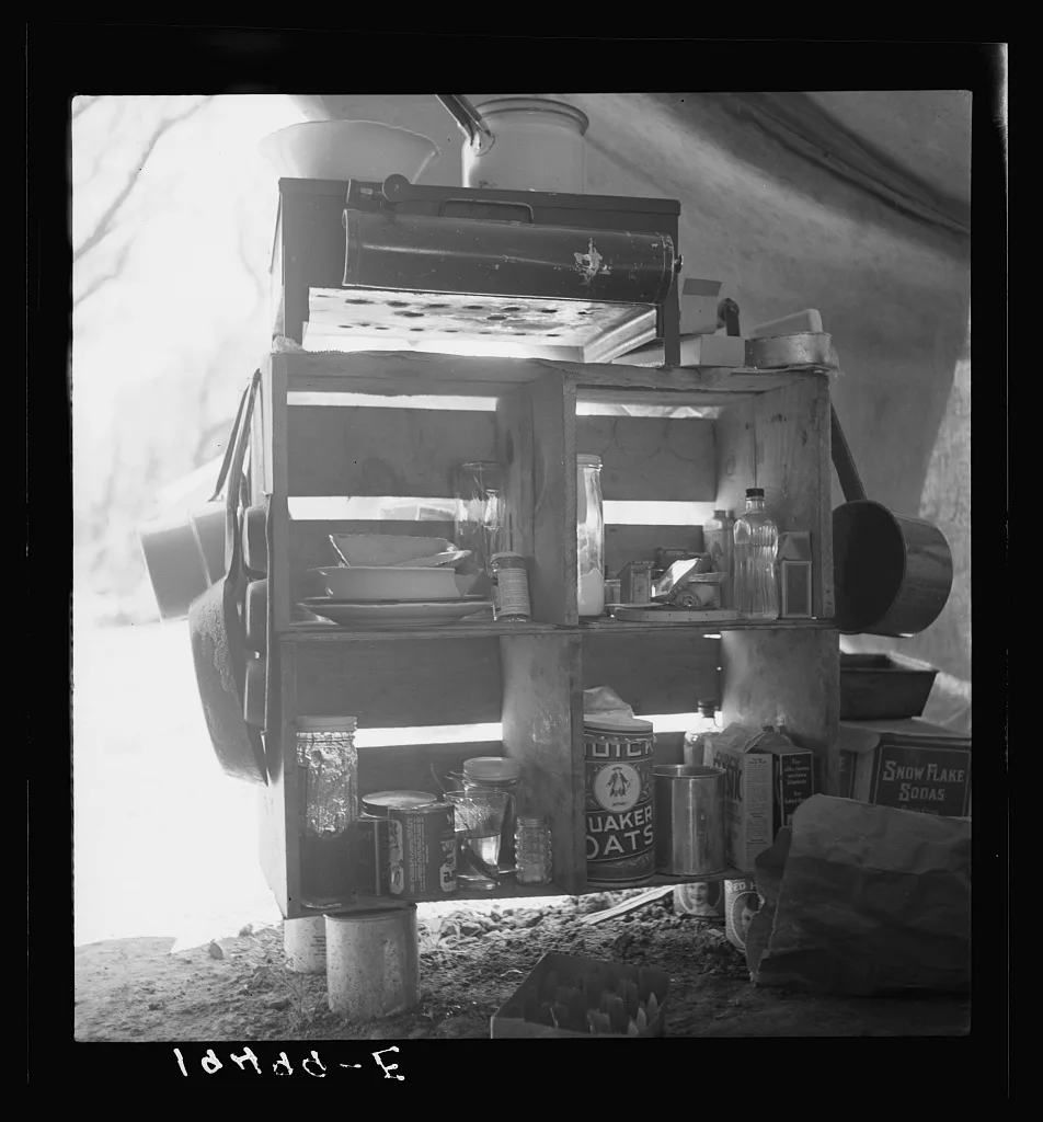 Tent interior in a labor contractor's camp, showing household…, California, 1939