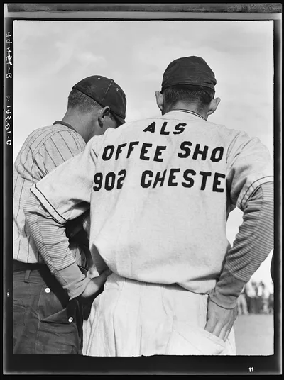 Watching ball game. Shafter migrant camp. California, 1938