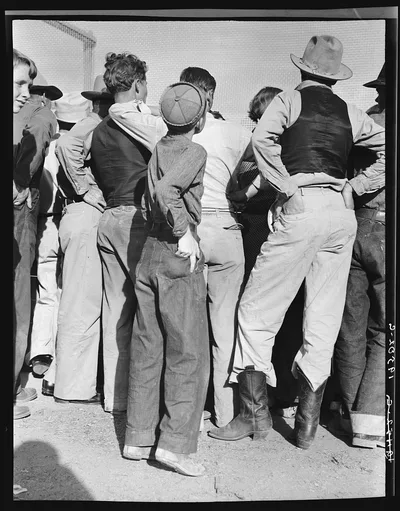 Watching ball game. Shafter migrant camp. California, 1938