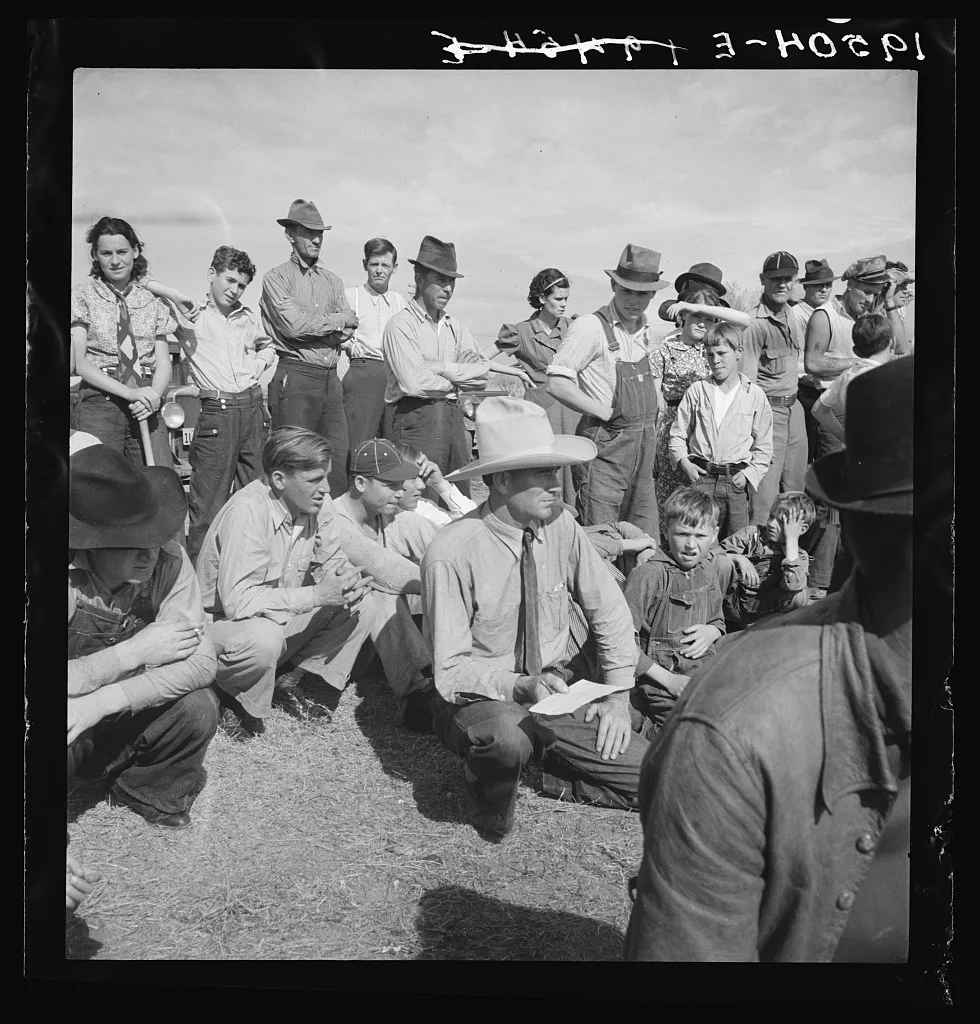 Watching ball game. Shafter camp for migrants. California, 1938