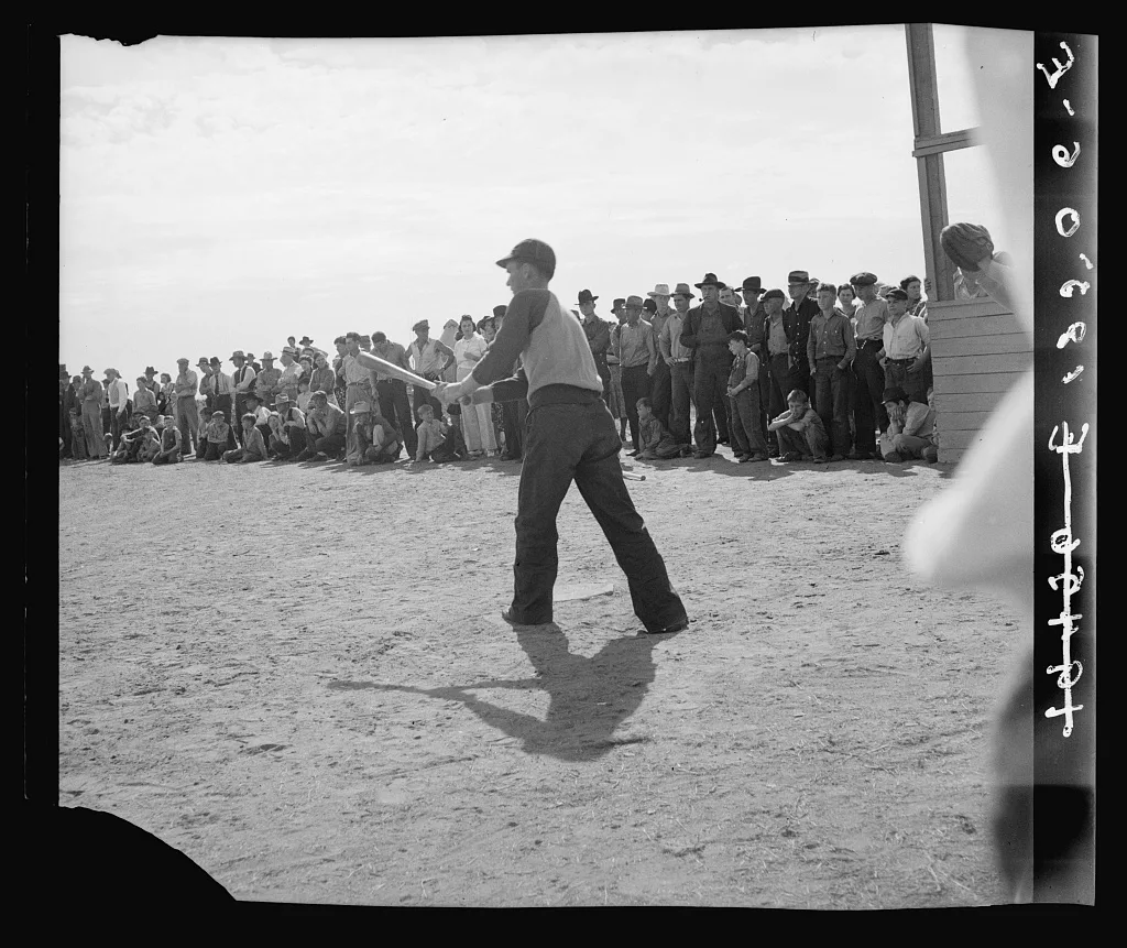 Ball game. Shafter migrant camp. California, 1938