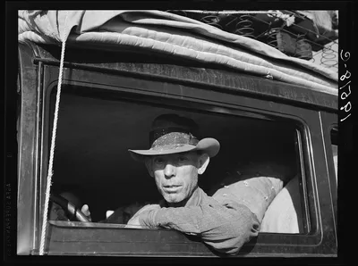 Merced (vicinity), California. Migratory cotton picker on highway…, 1939