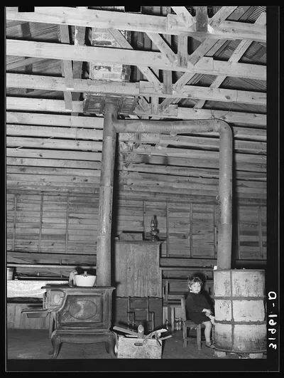 Stoves in former country church now used as residence. Near Laurel,…, Mississippi, 1939